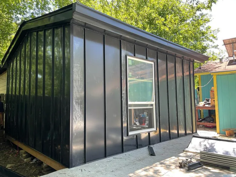 Black standing seam metal wall panels for Metal Roof Installation in North Cornwall